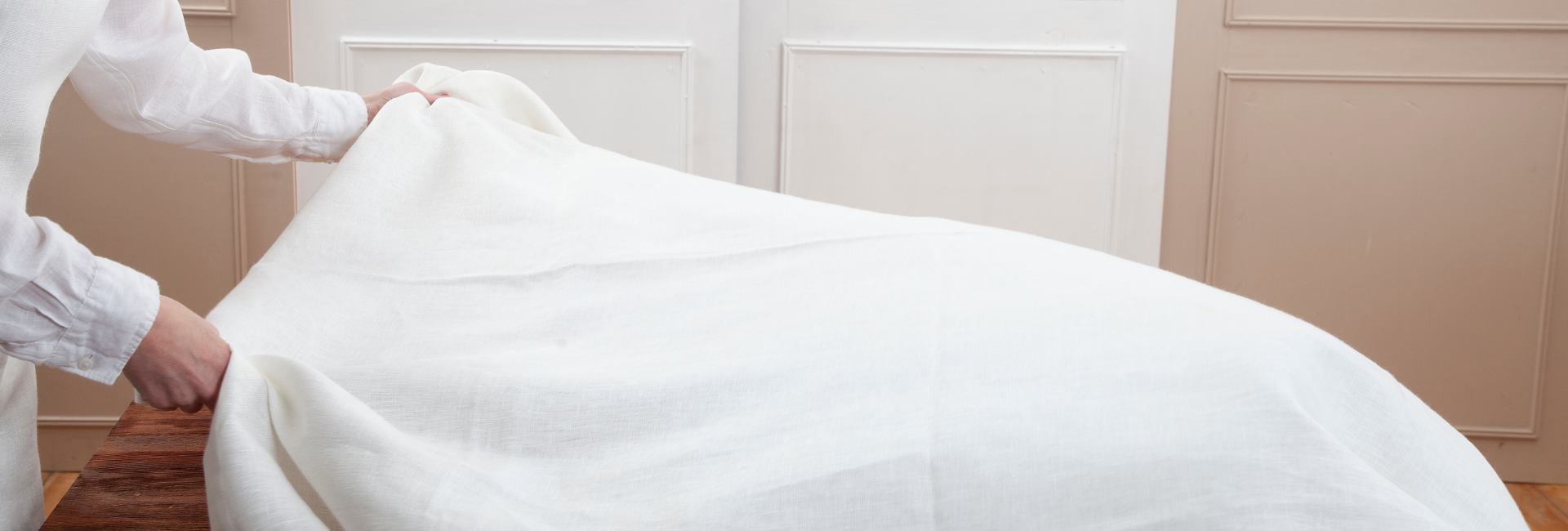 Table Cloth Being Placed On Table 1920X650